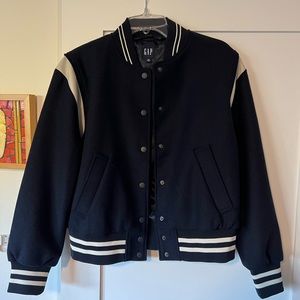 NWOT. Never worn. Gap wool varsity jacket. Fully lined.Navy blue/white.Men’s XS.
